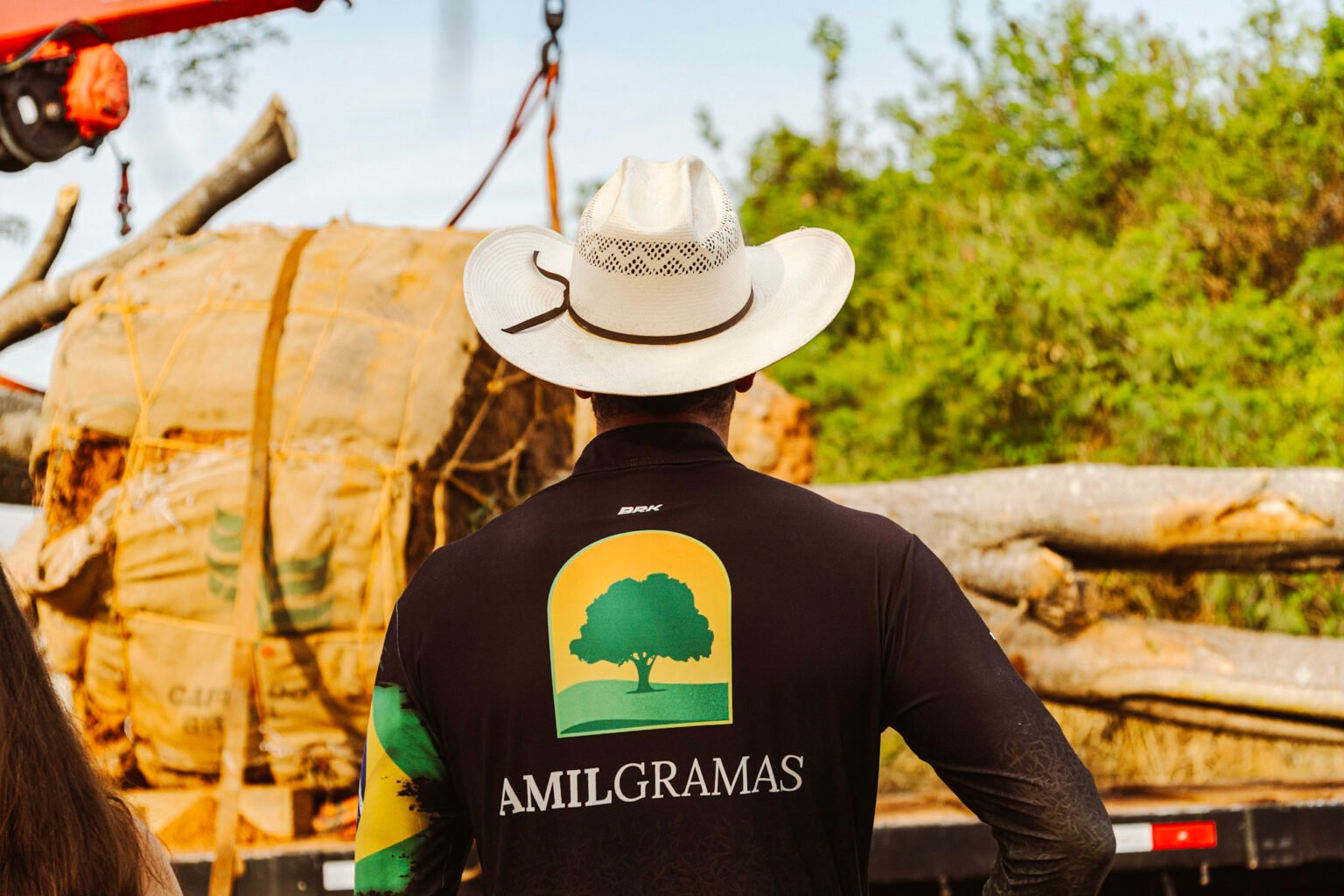 Profissional com uniforme da Amil Gramas